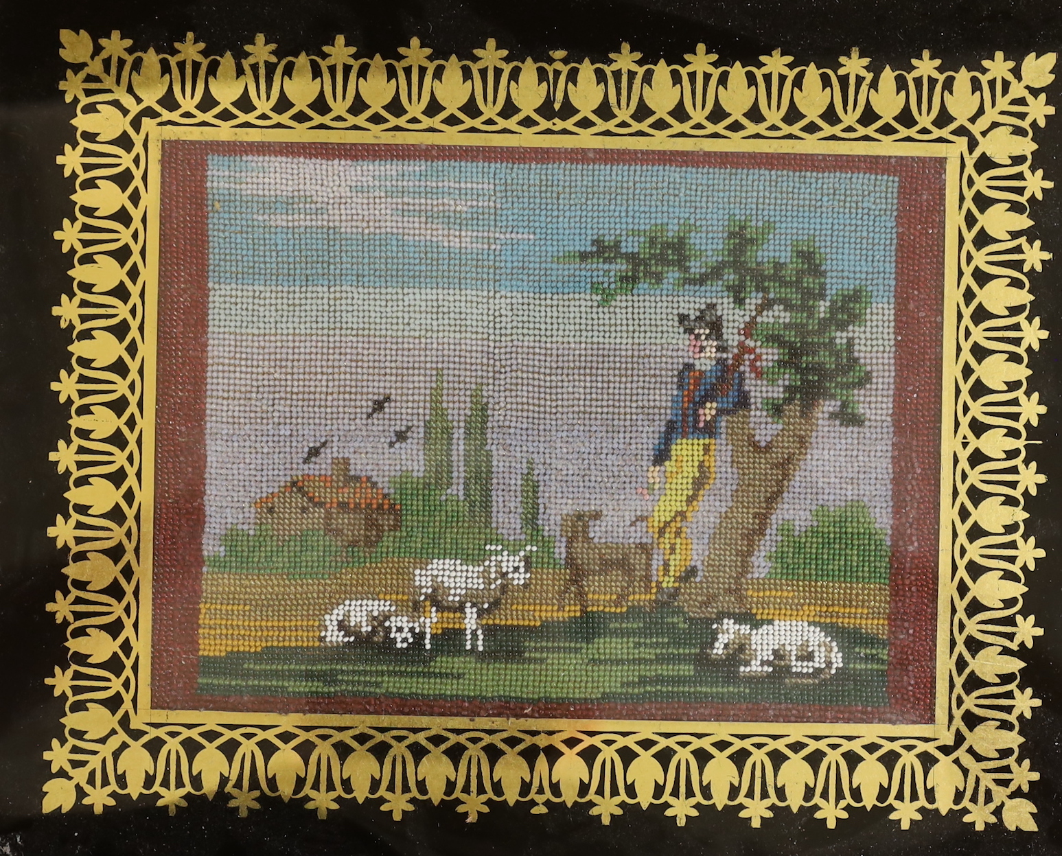 A pair of framed 19th century French beadwork panels, one pastoral scene, the other a boating scene, 19x25cm inside frames